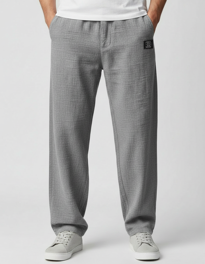 Close-up of button and zip fastening on men&